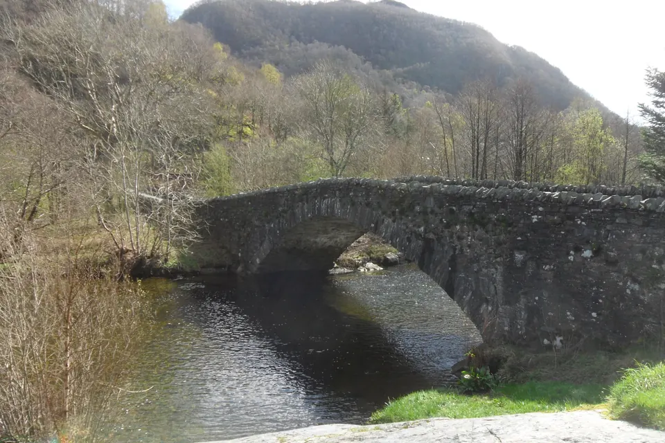 The stone arched bridge over the River Derwent at Grange in Borrowdale