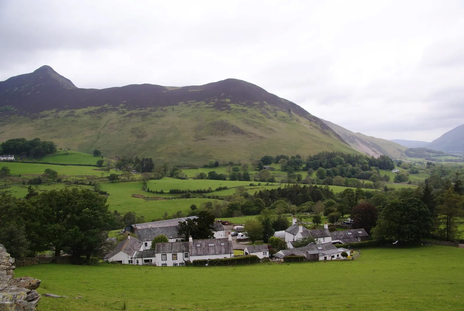 The white farmhouses of Little Town in the Newlands valley with fells behind