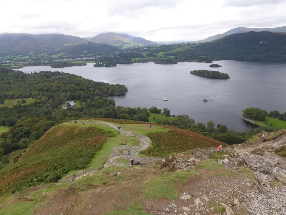 Looking down from high on Catbells to the path, the woods of Brandelhow and Derwentwater